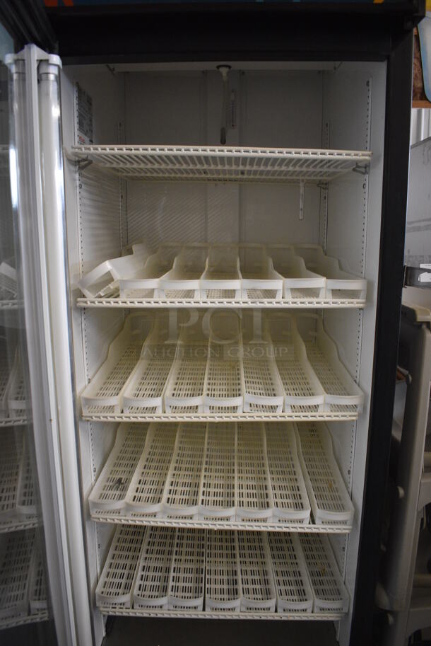 True Model GDM-23 Metal Commercial Single Door Reach In Cooler Merchandiser w/ Poly Coated Racks on Commercial Casters. 115 Volts, 1 Phase. 27x30x81. Tested and Powers On But Temps at 51 Degrees - Image 4 of 6