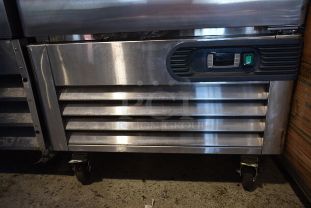 BRAND NEW SCRATCH AND DENT! 2020 Migali C-1RB-HC Stainless Steel Commercial Single Door Reach In Freezer w/ Poly Coated Racks on Commercial Casters. 115 Volts, 1 Phase. Tested and Powers On But Does Not Get Cold - Image 5 of 10