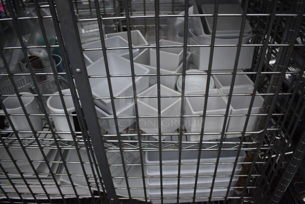 ALL ONE MONEY! Lot of Chrome Finish 5 Tier Shelving Unit on Commercial Casters w/ Liquor Cage and All Contents Including Glasses, White Ceramic Plates. BUYER MUST DISMANTLE. PCI CANNOT DISMANTLE FOR SHIPPING. PLEASE CONSIDER FREIGHT CHARGES. 38x25x68 - Image 8 of 10