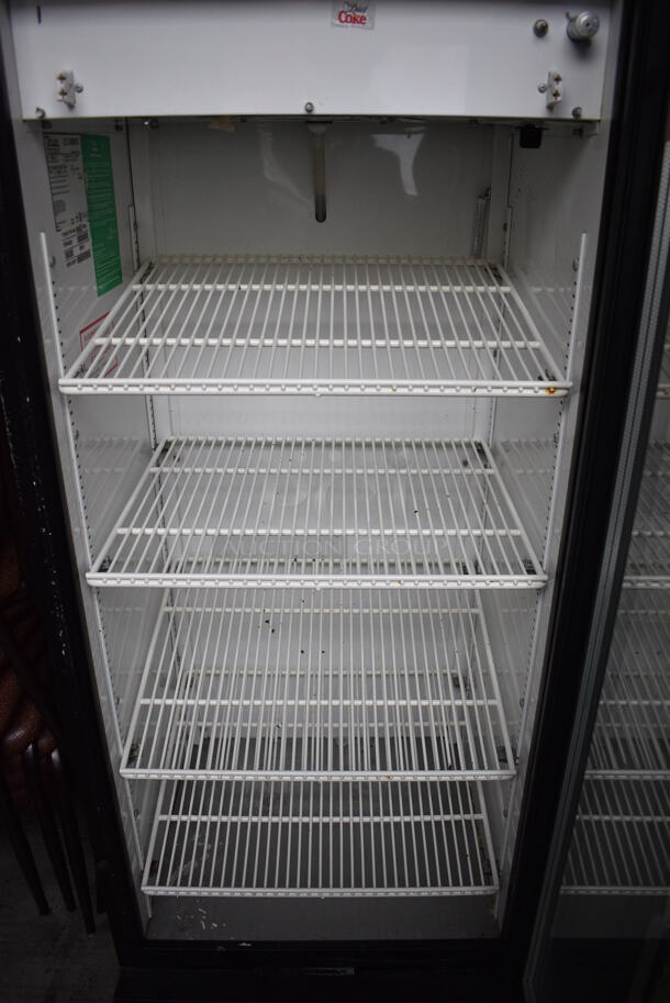 True Model GDM-12 Metal Commercial Single Door Reach In Cooler Merchandiser w/ Poly Coated Racks. 115 Volts, 1 Phase. 25x25x62.5. Tested and Powers On But Temps at 50 Degrees - Image 5 of 6