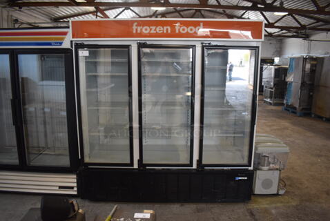 Master-Bilt BLG-74HDA Commercial 3-Door Merchandiser Freezer With Polycoated Shelves, White With Black Trimmed Doors. 115V, 1 Phase. Cannot Test Due To Plug Style