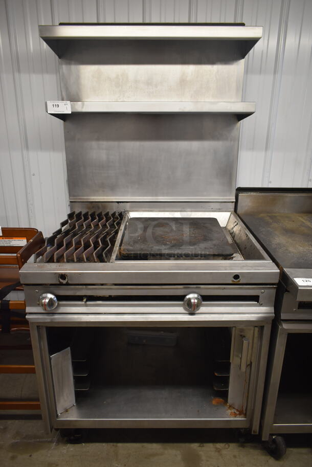 Jade Range JTRH-2-24IP Commercial Stainless Steel Heavy Duty Natural Gas Powered Range With Fry Top, Hot Top, Broiler, 2 Overshelves, And Box Of Additional Parts On Commercial Casters.