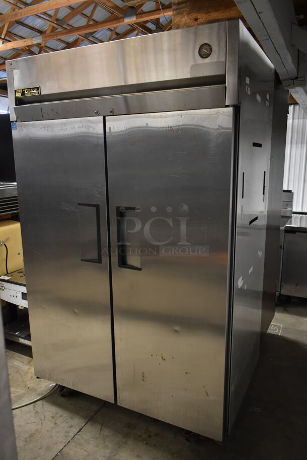 2013 True TG2R-2S ENERGY STAR Stainless Steel Commercial 2 Door Reach In Cooler w/ Poly Coated Racks on Commercial Casters. 115 Volts, 1 Phase. Tested and Working!