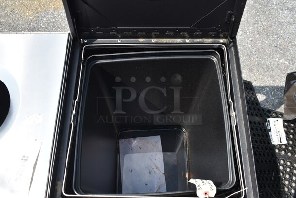 BRAND NEW SCRATCH AND DENT! Rubbermaid 690SC18EPLBK Silhouettes Black Steel Designer Square Waste Receptacle - 20 Gallon - Image 4 of 6