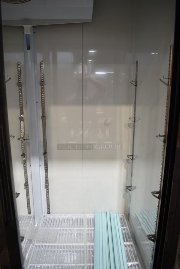 BRAND NEW SCRATCH AND DENT! 2023 Avantco 178GDS47HCB Metal Commercial 2 Door Reach In Cooler Merchandiser w/ Poly Coated Racks on Commercial Casters. 120 Volts, 1 Phase. Tested and Working! - Image 5 of 7