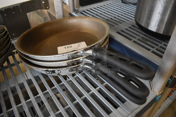 3 Metal Skillets. 20.5x12.5x2. 3 Times Your Bid!