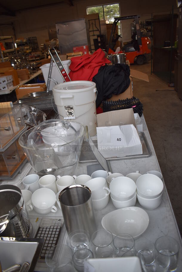 ALL ONE MONEY! Lot of Items on Tabletop Including Material, Poly Bucket, Ceramic Mugs and Wine Glasses and Metal Bins - Image 2 of 12