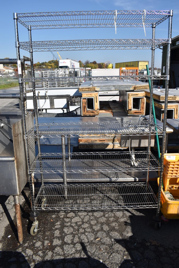 Chrome Finish 6 Tier Shelving Unit o Commercial Casters. BUYER MUST DISMANTLE. PCI CANNOT DISMANTLE FOR SHIPPING. PLEASE CONSIDER FREIGHT CHARGES. 48x18x77 - Image 1 of 4