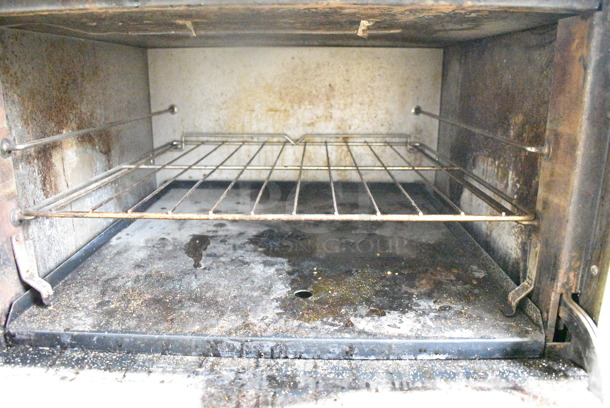 Southbend Stainless Steel Commercial Natural Gas Powered 6 Burner Range w/ Flat Top Griddle, 2 Ovens, Cheese Melter and Back Splash on Commercial Casters.  - Image 8 of 9