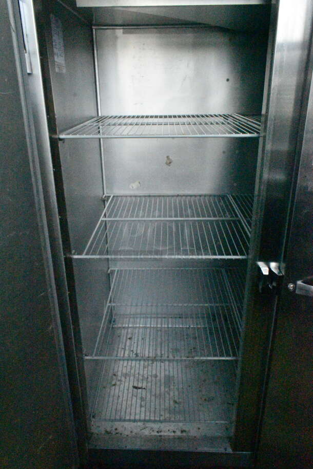 Traulsen G31010JC ENERGY STAR Stainless Steel Commercial 3 Door Reach In Freezer w/ Poly Coated Racks on Commercial Casters. 115 Volts, 1 Phase. Tested and Powers On But Does Not Get Cold
 - Image 6 of 7