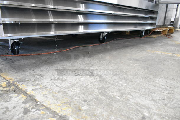 BRAND NEW SCRATCH AND DENT! KoolMore RIR-3D-SS Stainless Steel Commercial 3 Door Reach In Cooler w/ Poly Coated Racks on Commercial Casters. 115 Volts, 1 Phase. Tested and Working! - Image 8 of 11