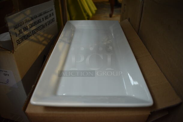 8 BRAND NEW IN BOX! White Ceramic Rectangular Plates. 7x14.25x1. 8 Times Your Bid!