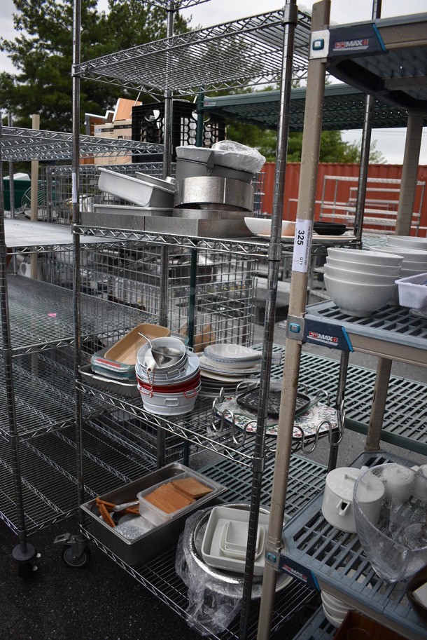 ALL ONE MONEY! Lot of Chrome Finish 5 Tier Shelving Unit on Commercial Casters w/ All Contents Including Metal Baking Pans, Buckets. BUYER MUST DISMANTLE. PCI CANNOT DISMANTLE FOR SHIPPING. PLEASE CONSIDER FREIGHT CHARGES. 36x18x92 - Image 1 of 5