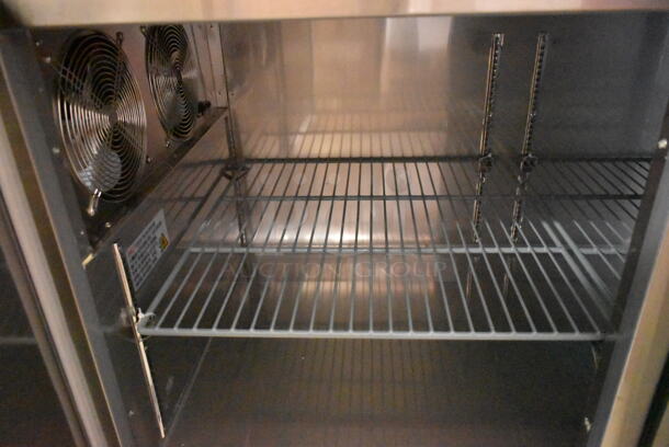 BRAND NEW SCRATCH AND DENT! 2023 Avantco 178SSPPT3 Stainless Steel Commercial Pizza Prep Table on Commercial Casters. 115 Volts, 1 Phase. Tested and Working! - Image 8 of 11