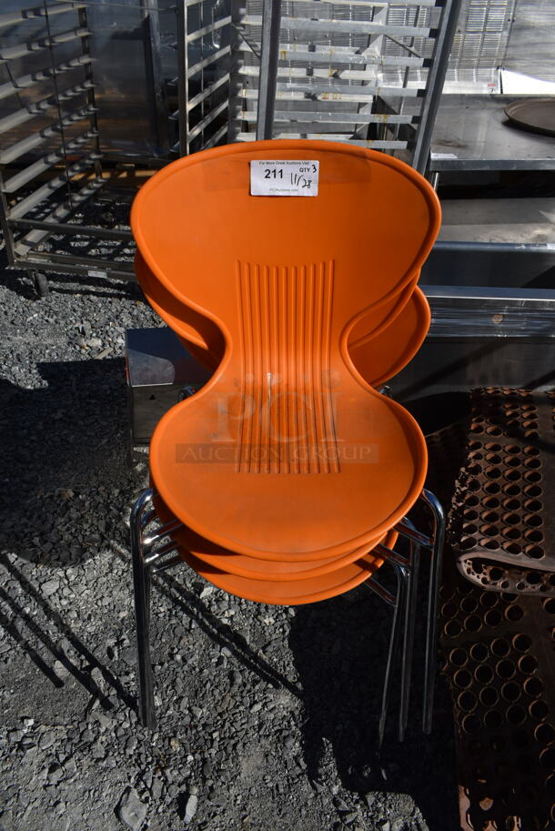 3 Orange Poly Dining Height Chairs on Metal Legs. 3 Times Your Bid! - Image 1 of 3