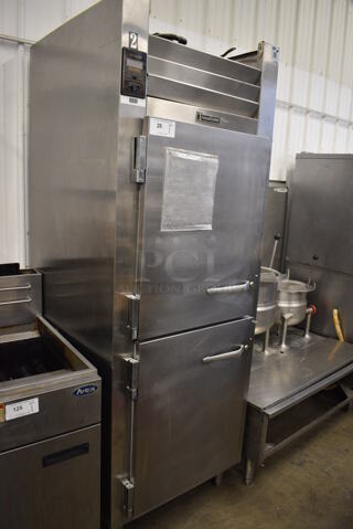 Traulsen RHT132WUT Stainless Steel Commercial 2 Half Size Door Reach In Cooler. 115 Volts, 1 Phase. 30x34x83. Tested and Working!