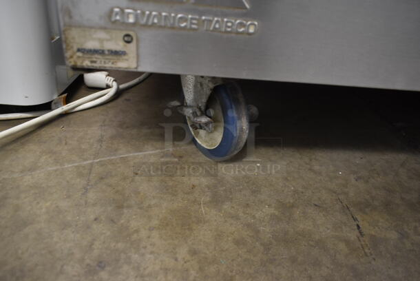 Advance Tabco Stainless Steel Commercial Counter w/ Back Splash and 2 Doors on Commercial Casters. - Image 4 of 5