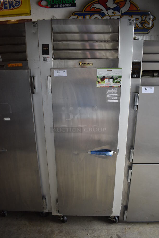 Traulsen Model G10011 Stainless Steel Commercial Single Door Reach In Cooler w/ Racks on Commercial Casters. 115 Volts, 1 Phase. 30x34x83.5. Tested and Working!
