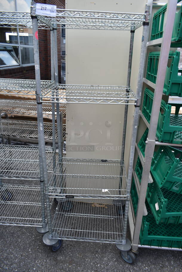 Chrome Finish 4 Tier Wire Shelving Unit on Commercial Casters. BUYER MUST DISMANTLE. PCI CANNOT DISMANTLE FOR SHIPPING. PLEASE CONSIDER FREIGHT CHARGES. - Image 1 of 4