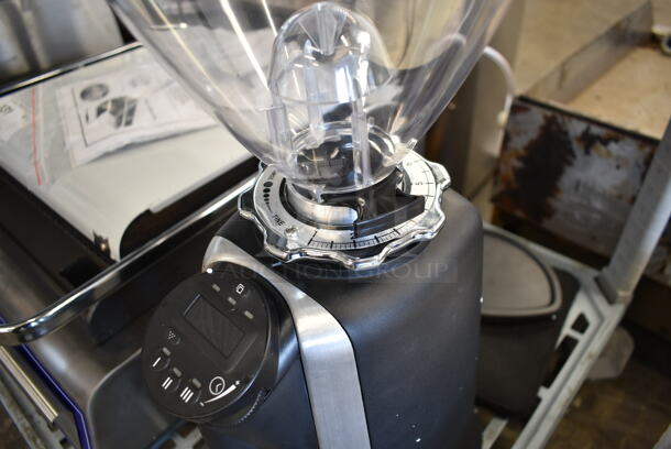 Mechanical interlock system on commercial coffee grinder hopper neck