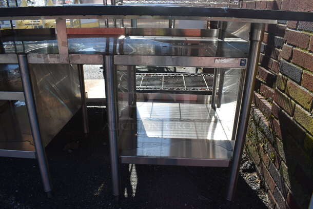 Stainless Steel Commercial Table w/ Black Countertop and Under Shelves. 60x40.5x35 - Image 2 of 5