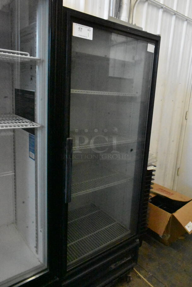 True GDM-12 Metal Commercial Single Door Reach In Cooler Merchandiser w/ Poly Coated Racks. 115 Volts, 1 Phase. Tested and Powers On But Does Not Get Cold