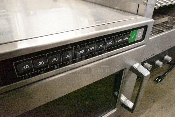 BRAND NEW SCRATCH AND DENT! 2024 Amana HDC1015 Stainless Steel  Heavy-Duty Stainless Steel Commercial Microwave with Push Button Controls. 120 Volts 1 Phase.  - Image 4 of 5