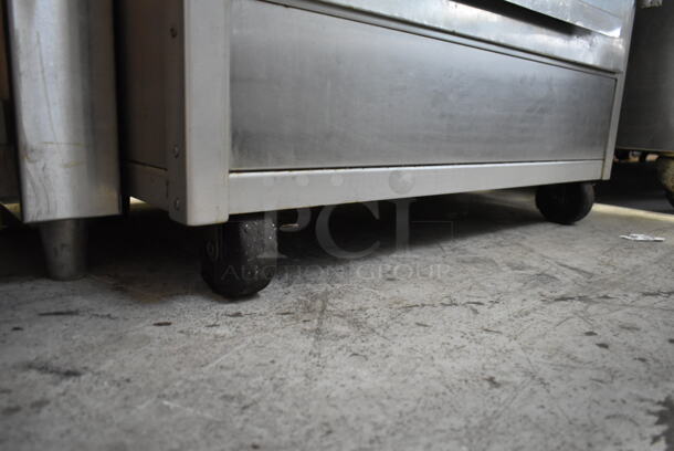 Stainless Steel Commercial Floor Style Natural Gas Powered 7 Spit Rotisserie Oven on Commercial Casters. - Image 4 of 7