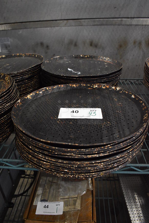 43 Metal Perforated Round Baking Pans. 13.25x13.25x1. 43 Times Your Bid!