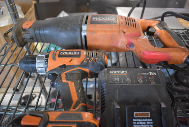 ALL ONE MONEY! Tier Lot of Various Tools Including Rigid R3001 Saw, Rigid R860052 Drill, Rigid Battery Charger, Ramset MasterShot Fastener, Ryobi P246 Series D Multi Tool, DeWalt DW9099 Drill, DeWalt Battery and Charger, DeWalt DWE4011 Angle Grinder, DeWalt D28402 Angle Grinder. - Image 2 of 12