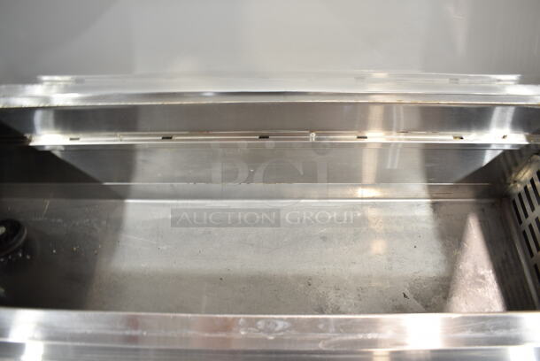 BRAND NEW SCRATCH AND DENT! 2023 Avantco 178APPT91HC Stainless Steel Commercial Pizza Prep Table. Comes w/ Commercial Casters. 115 Volts, 1 Phase. Tested and Does Not Power On - Image 3 of 9