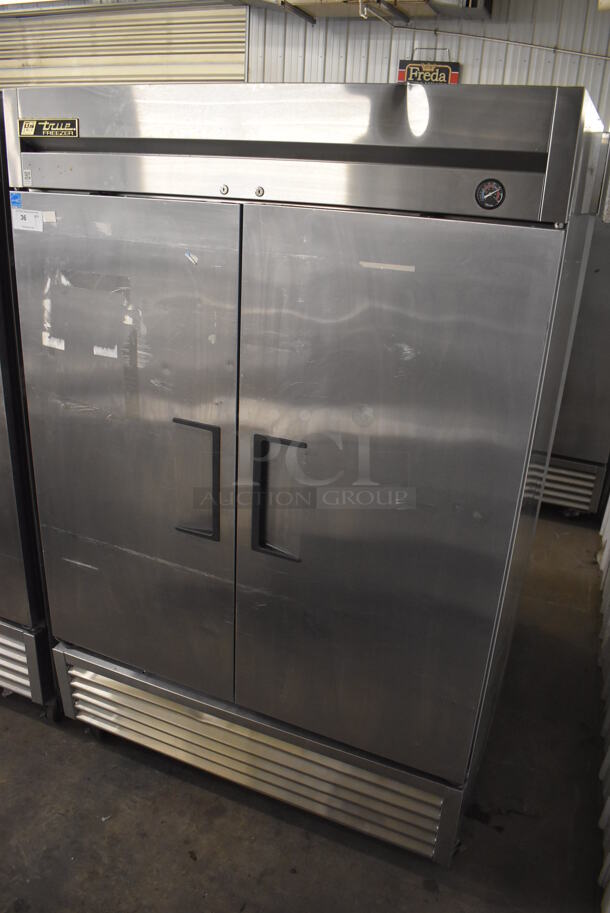 2013 True T-49F ENERGY STAR Stainless Steel Commercial 2 Door Reach In Freezer w/ Poly Coated Racks on Commercial Casters. 115 Volts, 1 Phase. 54x30x83. Tested and Working! - Image 2 of 7