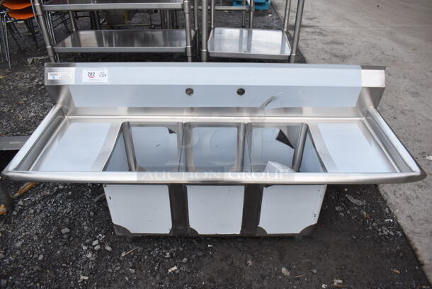 BRAND NEW SCRATCH AND DENT! Steelton 522CS31014LR Stainless Steel Commercial 18-Gauge Three Bay Sink w/ Dual Drain Boards. No Legs. 54x19x23. Bays 10x14x12. Drain Boards 10x16x1 - Image 1 of 5