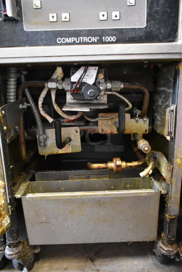 Henny Penny 600 Stainless Steel Commercial Floor Style Natural Gas Powered Pressure Fryer w/ Metal Fry Basket on Commercial Casters. 80,000 BTU. - Image 6 of 7