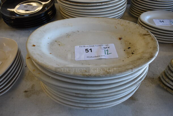 12 White Ceramic Oval Plates. 12.5x9x1. 12 Times Your Bid!