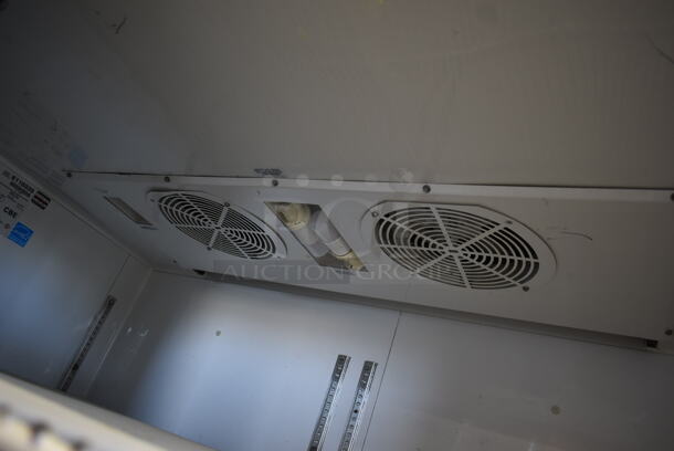 2014 True TG2R-2S ENERGY STAR Stainless Steel Commercial 2 Door Reach In Cooler w/ Poly Coated Racks on Commercial Casters. 115 Volts, 1 Phase. Tested and Working! - Image 7 of 8