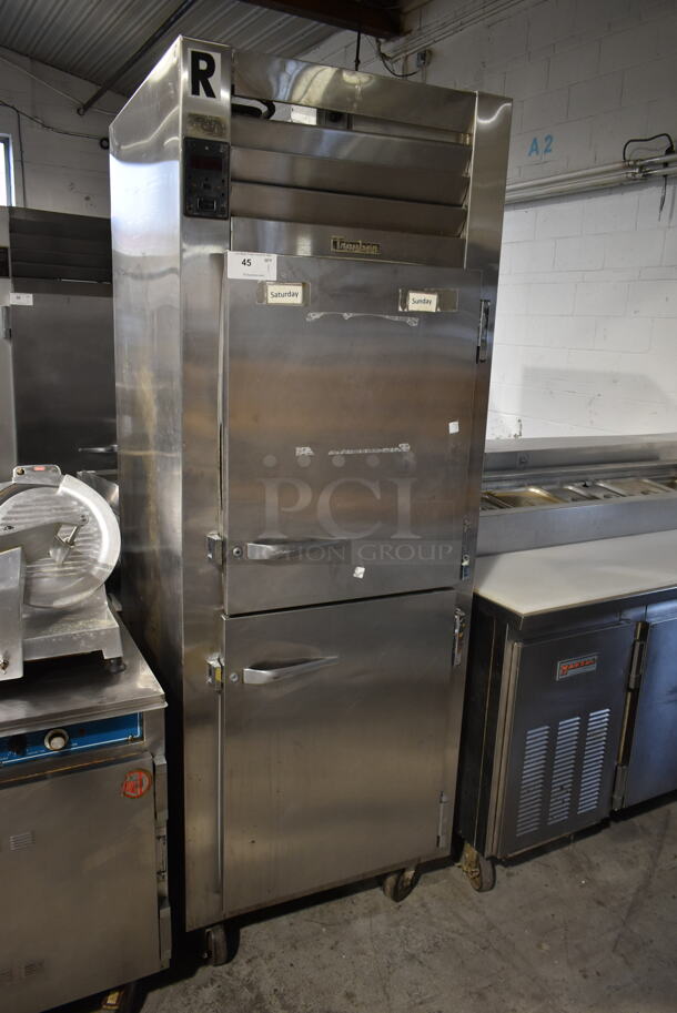 Traulsen RHT 1-32WUT Stainless Steel Commercial 2 Half Size Door Reach In Cooler w/ Racks on Commercial Casters. 115 Volts, 1 Phase. Tested and Powers On But Does Not Get Cold - Image 1 of 7