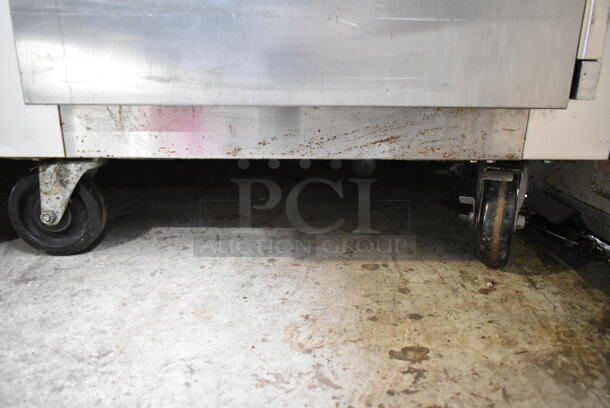 Traulsen G10010 ENERGY STAR Stainless Steel Commercial Single Door Reach In Cooler w/ Poly Coated Racks on Commercial Casters. 115 Volts, 1 Phase. Tested and Working! - Image 2 of 4