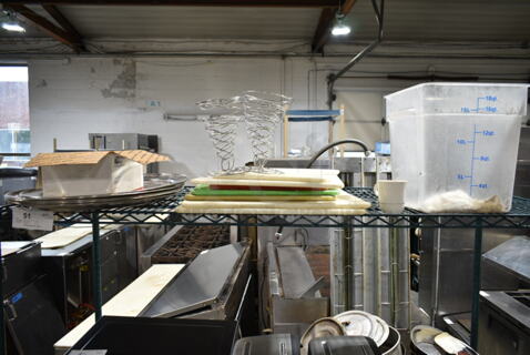 ALL ONE MONEY! Tier Lot of Various Items Including Poly Bin, Pizza Cone Holders, Cutting Boards and Round Trays. 