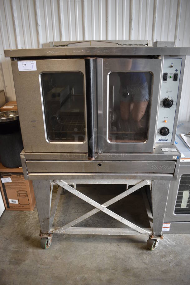 	Garland SunFire Stainless Steel Commercial Natural Gas Powered Full Size Convection Oven w/ View Through Doors, Metal Oven Racks and Thermostatic Controls on Stand w/ Commercial Casters. 40x41x63