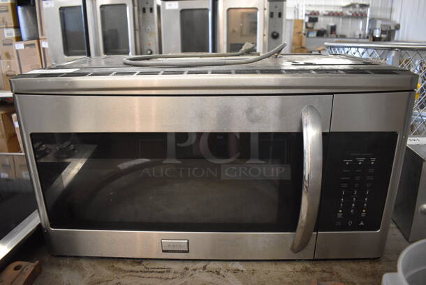 Frigidaire Model FGMV154CLFA Chrome Finish Microwave Oven w/ Plate. 30x16x16 - Image 1 of 4
