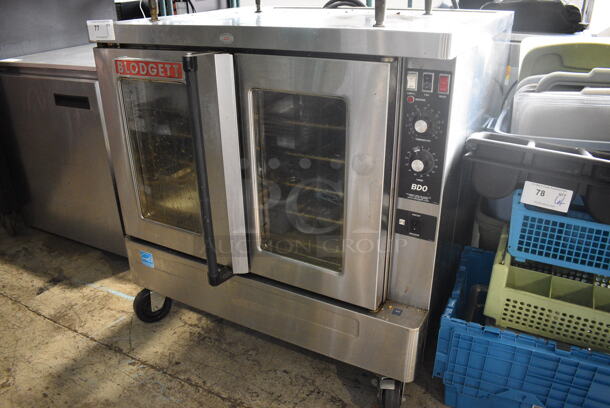 Blodgett Model BDO-100-E Stainless Steel Commercial Electric Powered Full Size Bakery Depth Convection Oven w/ View Through Doors, Metal Oven Racks and Thermostatic Controls on Commercial Casters. 240 Volts, 3 Phase. 38x37x39