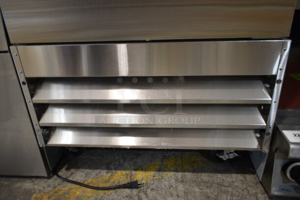 BRAND NEW SCRATCH AND DENT! 2023 Avantco 178A23RHC Stainless Steel Commercial Single Door Reach In Cooler w/ Poly Coated Racks on Commercial Casters. 115 Volts, 1 Phase. Tested and Working! - Image 5 of 8