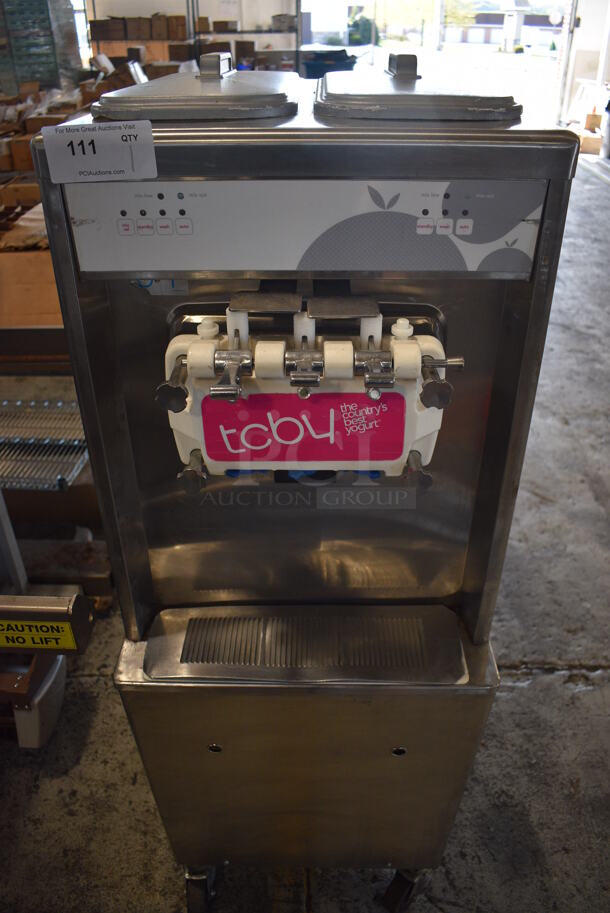 2010 Taylor Model 794-33 Stainless Steel Commercial Floor Style 2 Flavor w/ Twist Air Cooled Soft Serve Ice Cream Machine on Commercial Casters. 208-230 Volts, 3 Phase. 20x33x60