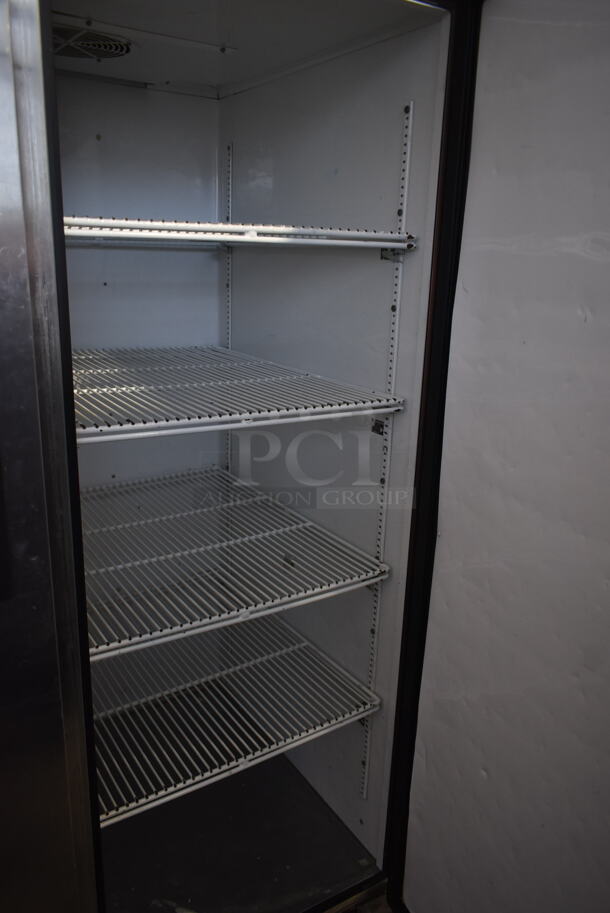 2012 True TG2R-2S ENERGY STAR Stainless Steel Commercial 2 Door Reach In Cooler w/ Poly Coated Racks on Commercial Casters. 115 Volts, 1 Phase. Tested and Working! - Image 6 of 7