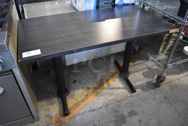 Gray Wood Pattern Table on 2 Black Metal Table Bases. 48x24x29