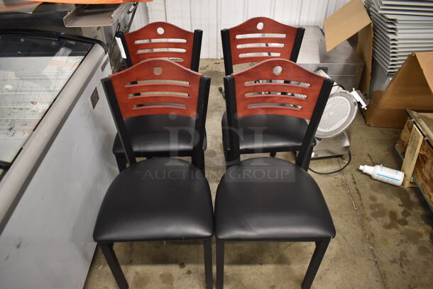 4 Black Cushioned Chairs With Wood Style Ladder Backs On Black Legs. 4 Times Your Bid! Cosmetic Condition May Vary.