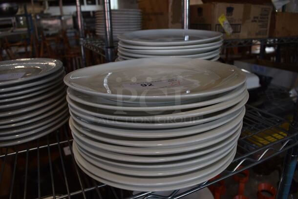 27 White Ceramic Plates. 11x11x1. 27 Times Your Bid! - Image 1 of 3