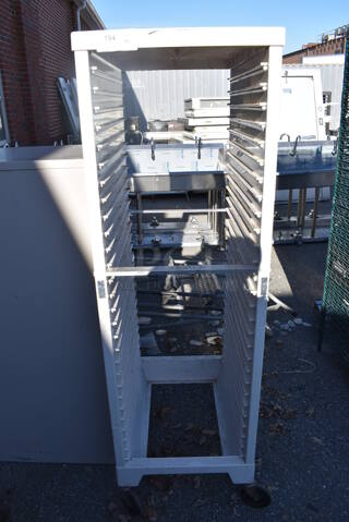 Metal Pan Transport Rack on Commercial Casters. 21x29x67