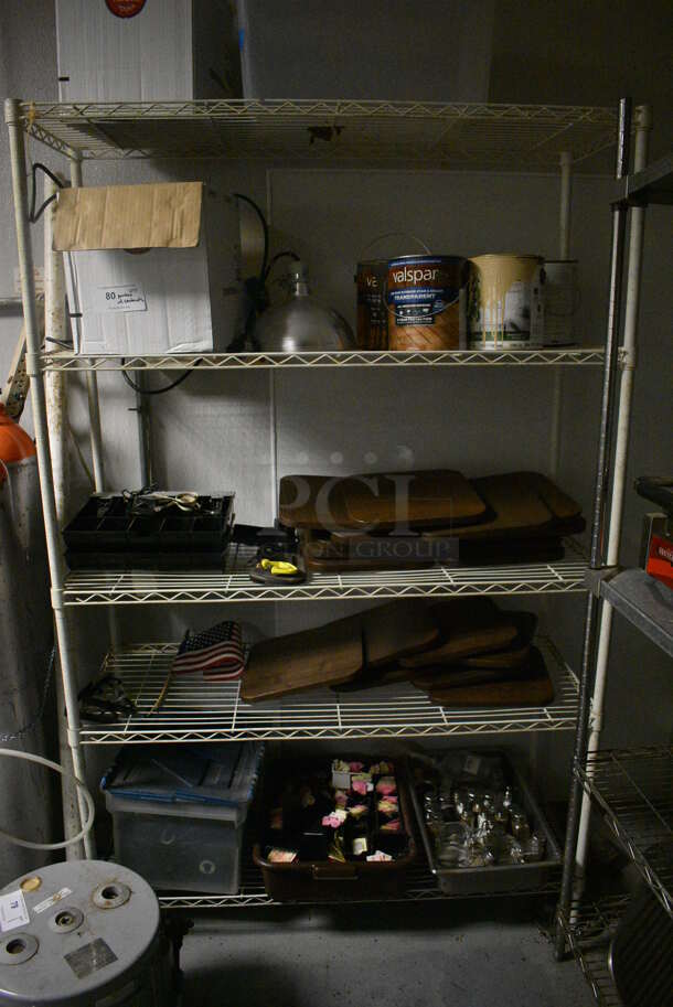White Finish 5 Tier Wire Shelving Unit w/ Contents Including Paint, Boards and Sugar Caddies. BUYER MUST REMOVE. BUYER MUST DISMANTLE. PCI CANNOT DISMANTLE FOR SHIPPING. PLEASE CONSIDER FREIGHT CHARGES. 48x18x75. (kitchen)